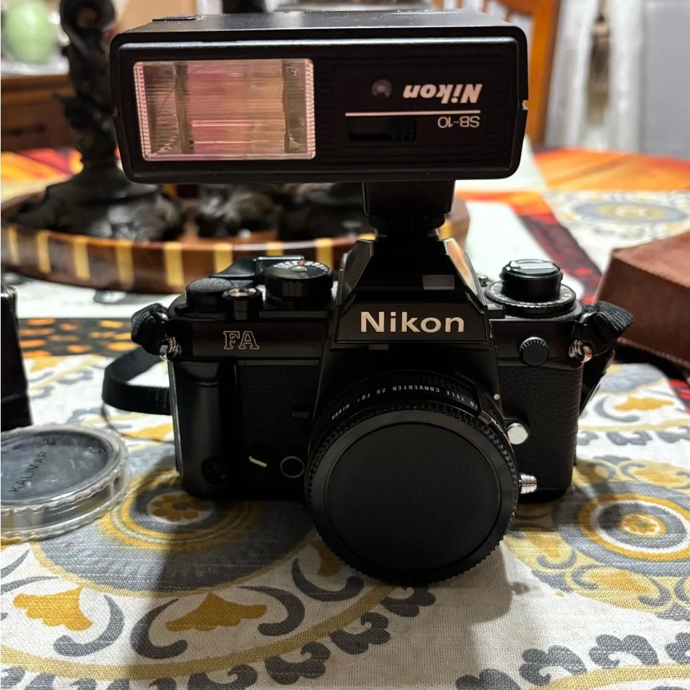 Nikon Black 300mm Telephoto Lens camera and multiple lenses and other parts
